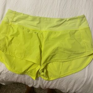 Neon Lululemon shorts.